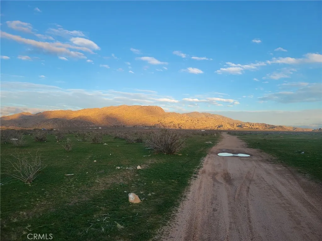 0 Pahute Road Apple Valley, CA 92307 - Photo 7 of 9 a view of a city street next to a yard