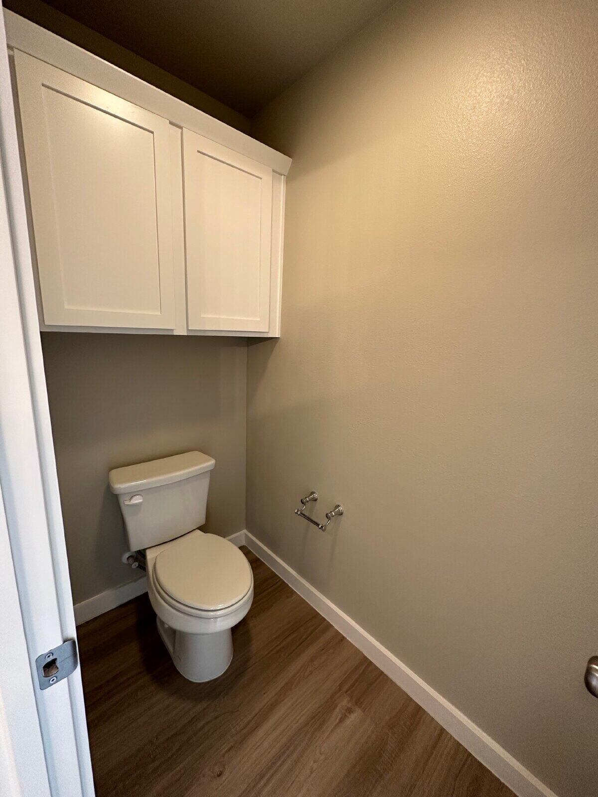 2005 135th Street Lubbock, TX 79423 - Photo 10 of 13 a bathroom with a toilet and a sink