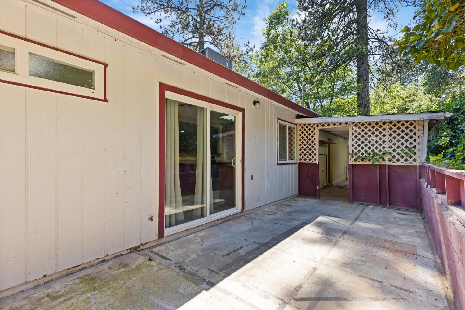 2971 Letitia Avenue Placerville, CA 95667 - Photo 48 of 65 a view of backyard with a large tree and wooden fence