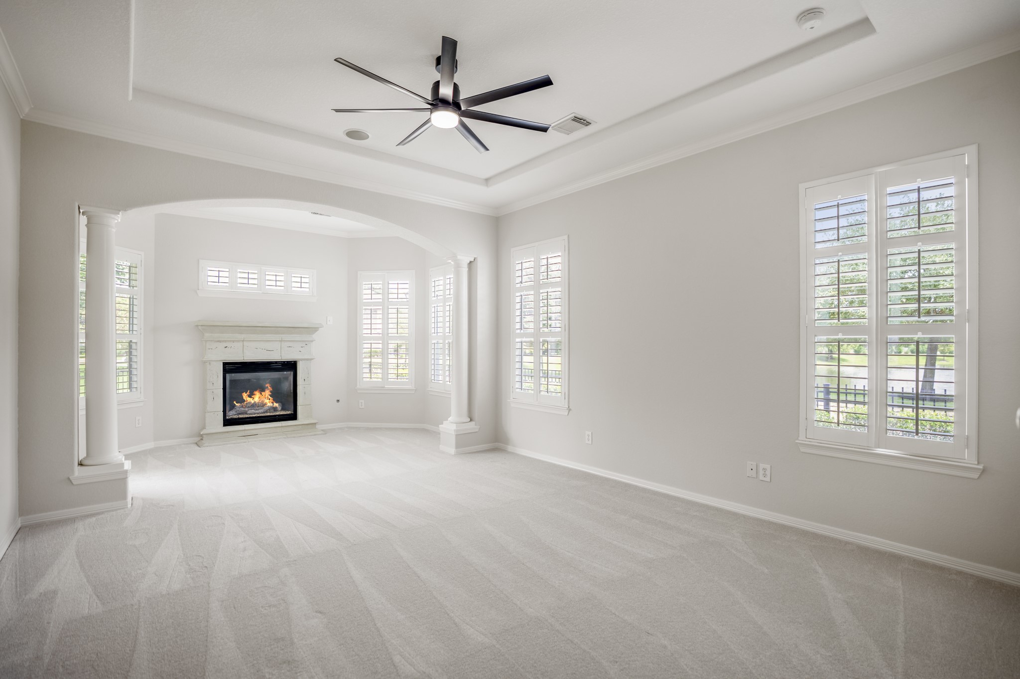 18602 Yorkshire Manor Court Spring, TX 77379 - Photo 21 of 50 a view of an empty room with a window and a fireplace
