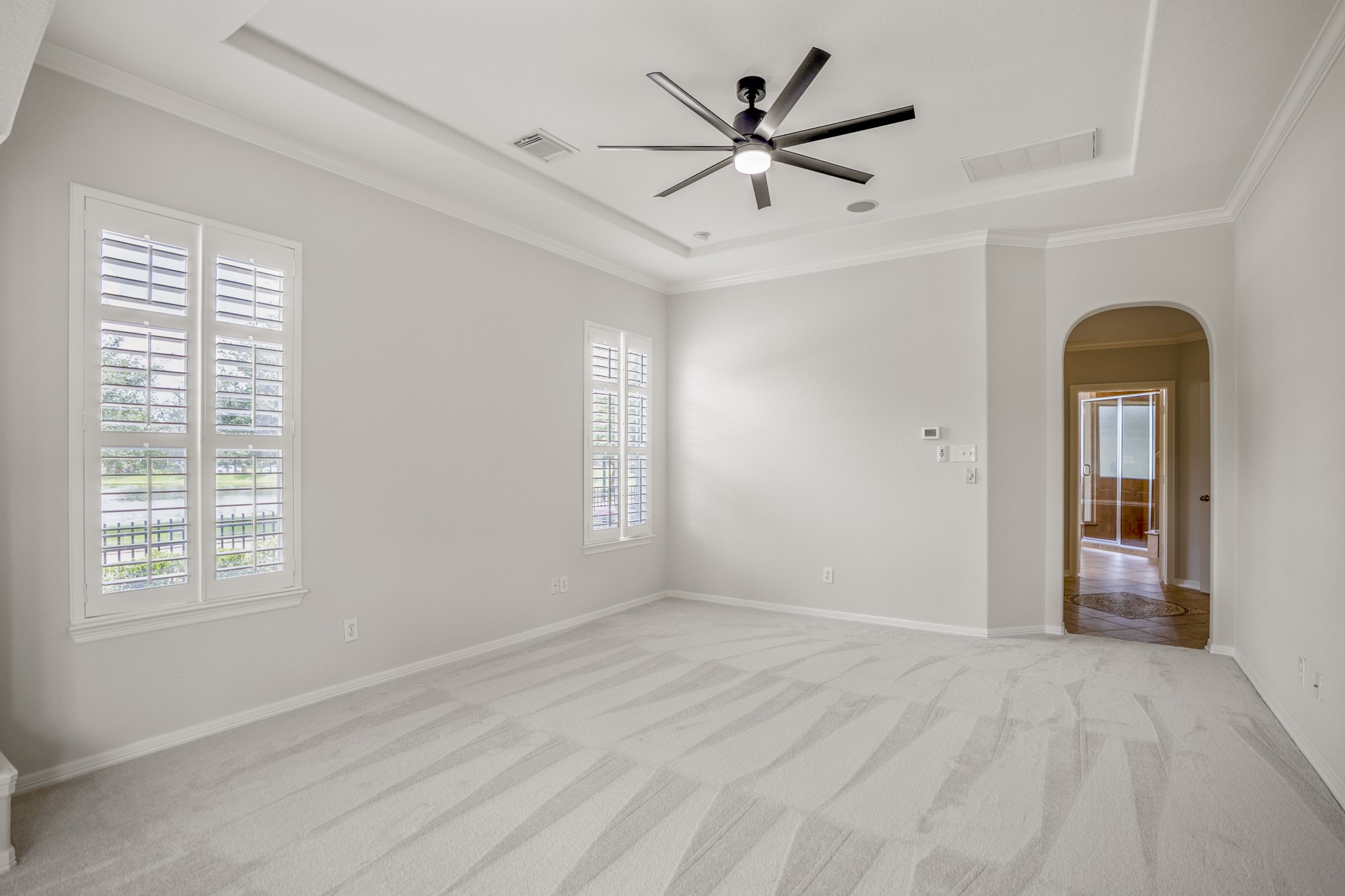 18602 Yorkshire Manor Court Spring, TX 77379 - Photo 23 of 50 a view of a livingroom with a ceiling fan and window