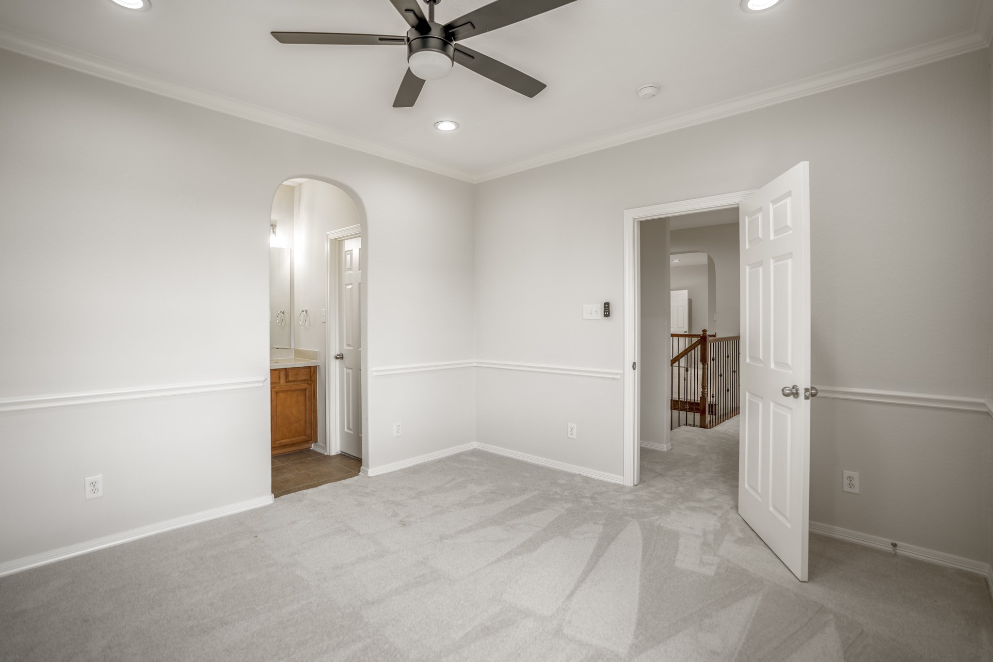 18602 Yorkshire Manor Court Spring, TX 77379 - Photo 28 of 50 an empty room with closet and a ceiling fan