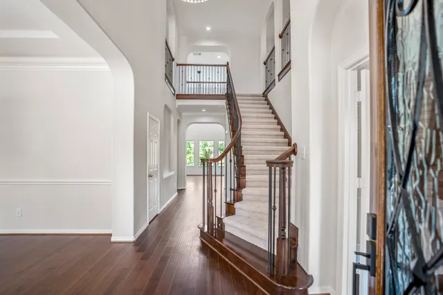 a view of entryway with wooden floor