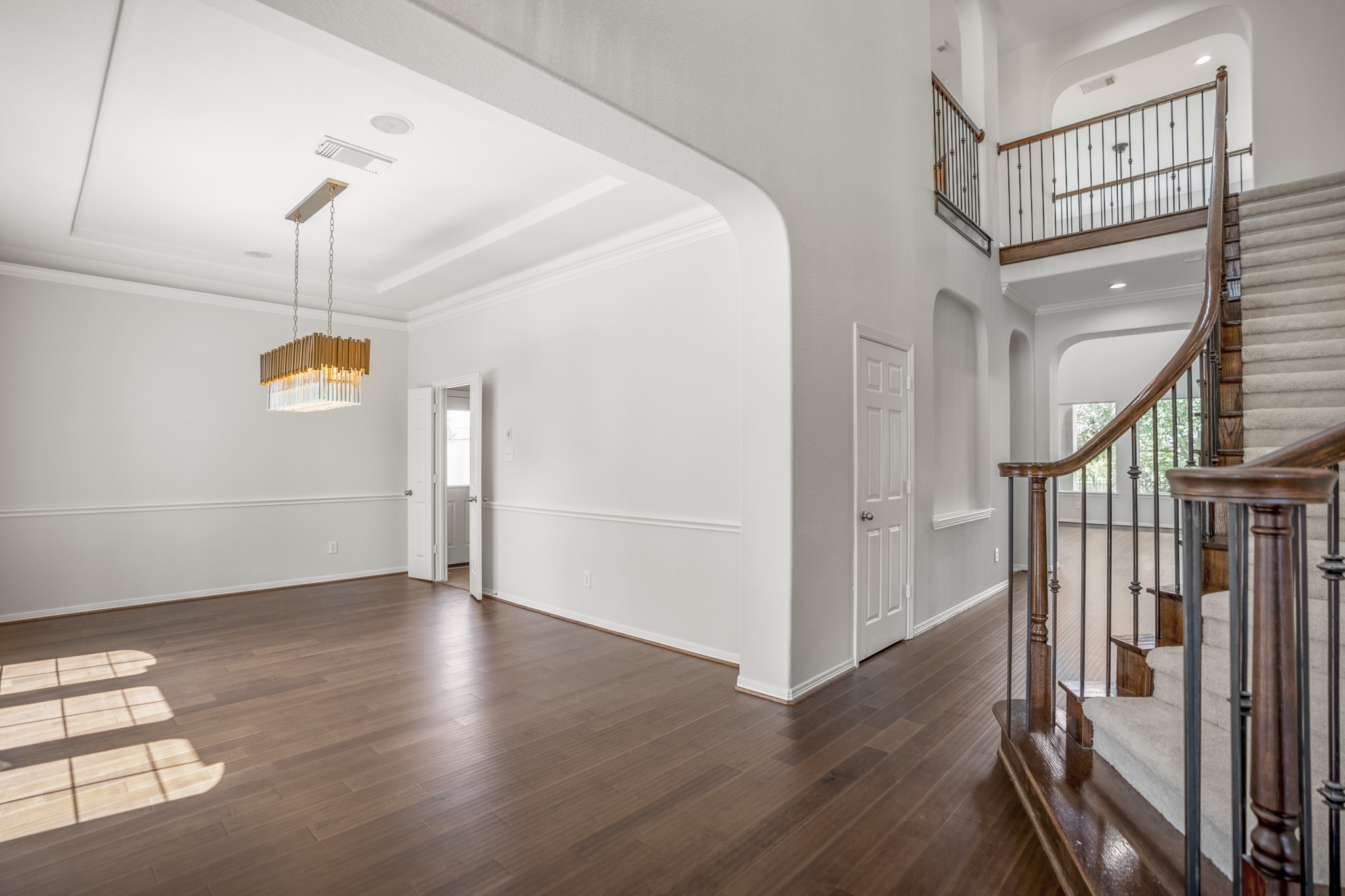 18602 Yorkshire Manor Court Spring, TX 77379 - Photo 4 of 50 a view of entryway with stairs and wooden floor
