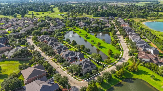 a view of green field with sitting area