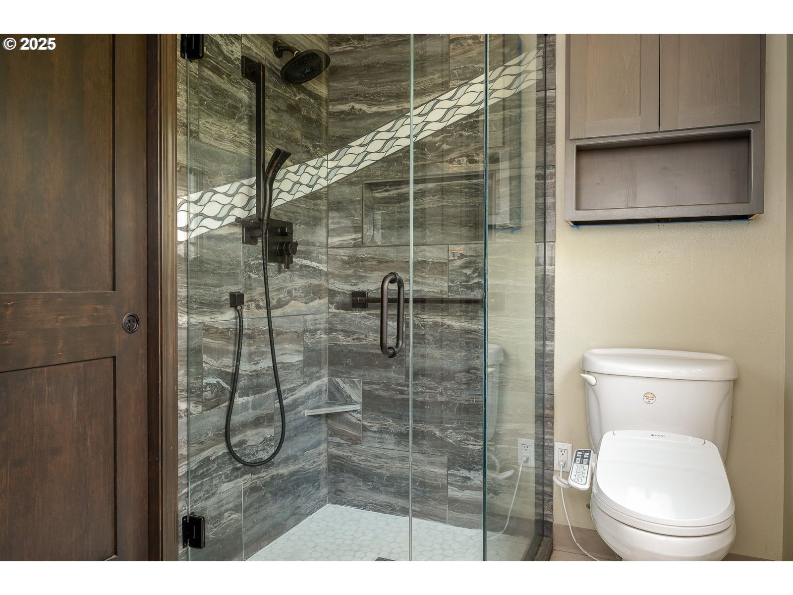 18335 Southeast 370th Avenue Sandy, OR 97055 - Photo 16 of 42 a bathroom with a toilet and a shower