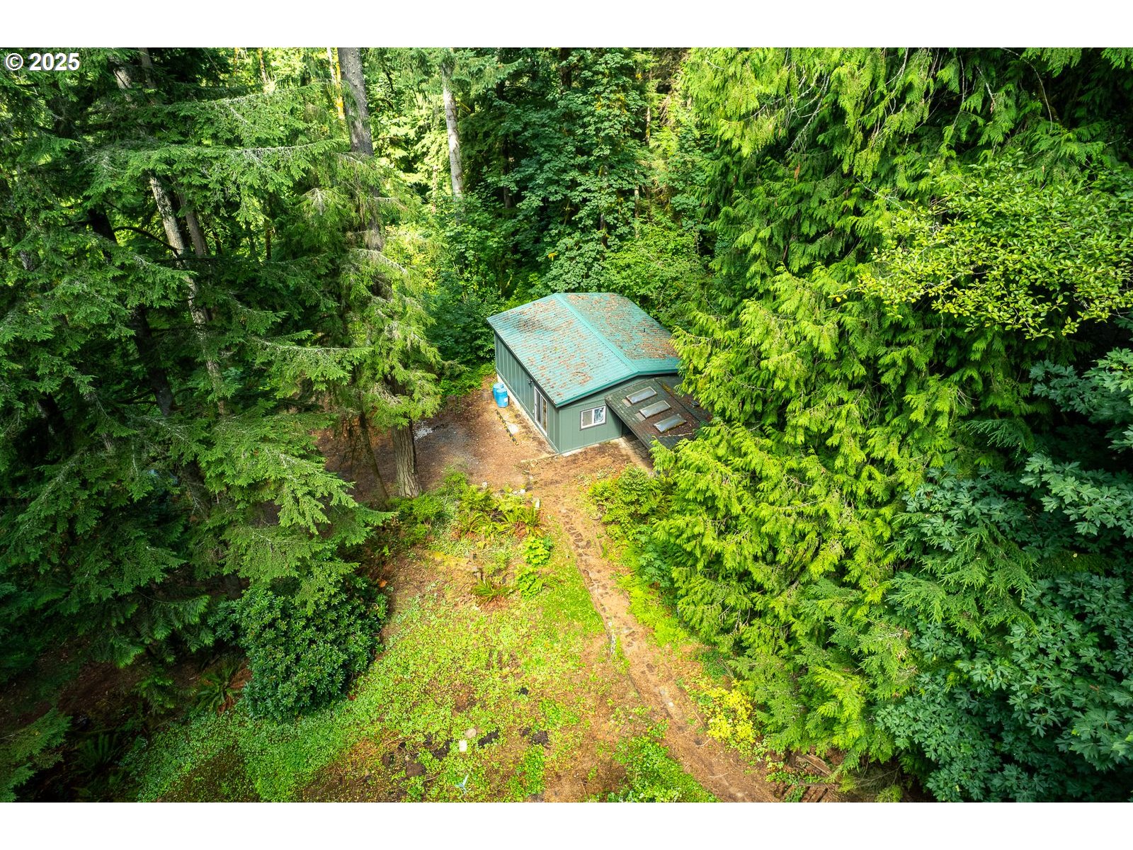 18335 Southeast 370th Avenue Sandy, OR 97055 - Photo 28 of 42 a backyard of a house with a seating space