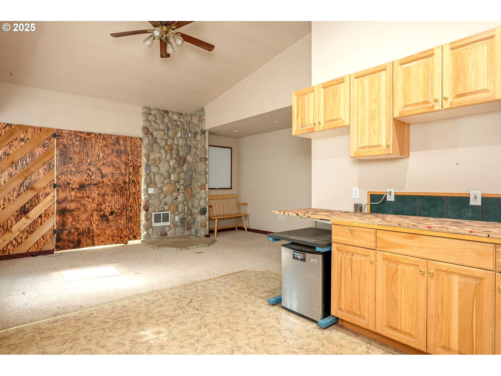 18335 Southeast 370th Avenue Sandy, OR 97055 - Photo 30 of 42 a kitchen with stainless steel appliances granite countertop a sink a stove and a refrigerator