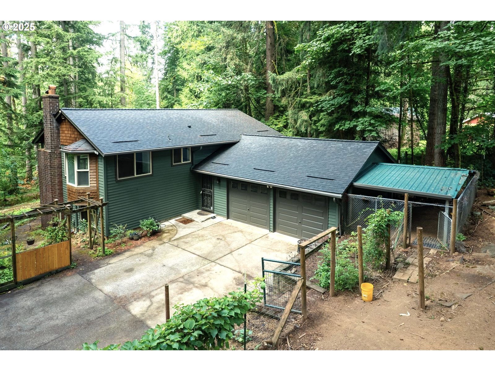 18335 Southeast 370th Avenue Sandy, OR 97055 - Photo 5 of 42 a backyard of a house with yard and outdoor seating