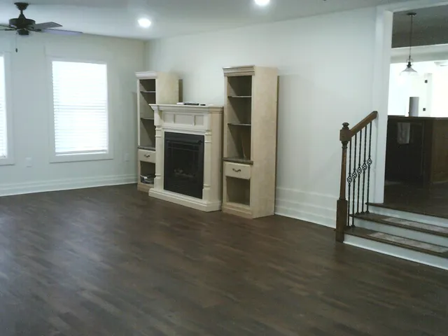 a kitchen with stainless steel appliances a sink a stove and a refrigerator