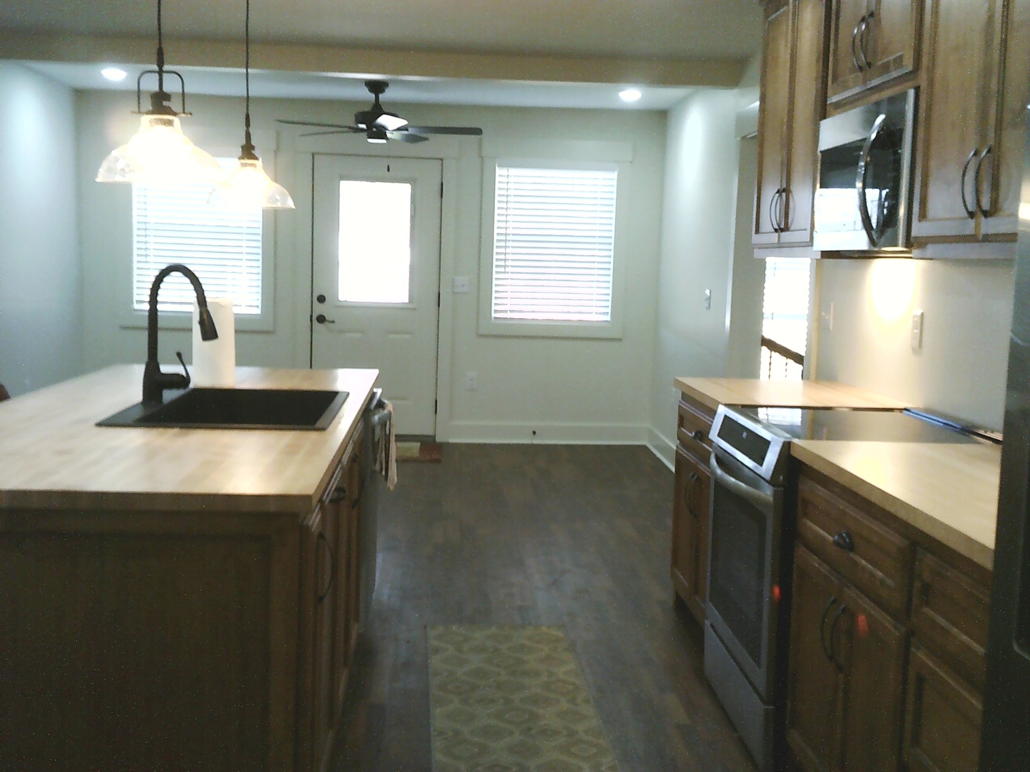 124 Hayes Fork Creek Road Dover, TN 37058 - Photo 17 of 29 a kitchen with stainless steel appliances a sink a stove and a refrigerator