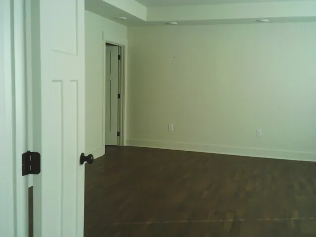 a view of a room with racks on the wall