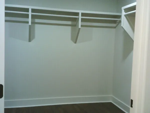 a bathroom with a bath tub with a shower