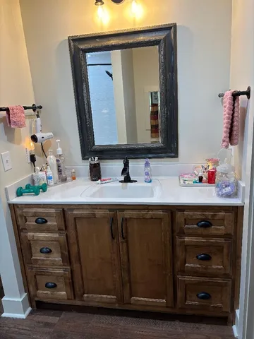 a bathroom with a toilet and a sink