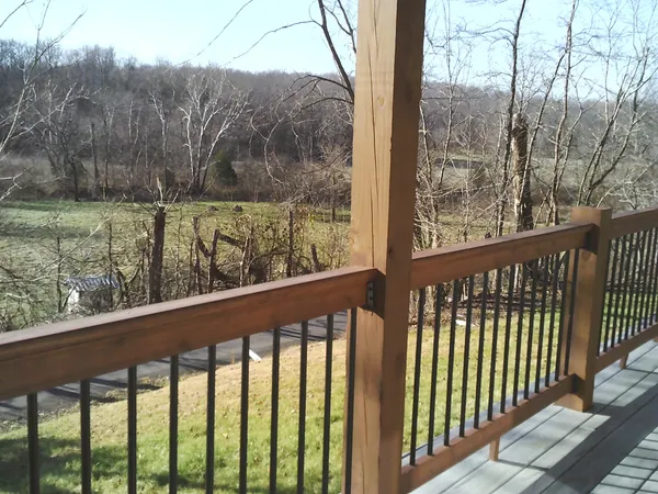 a view of a house with backyard
