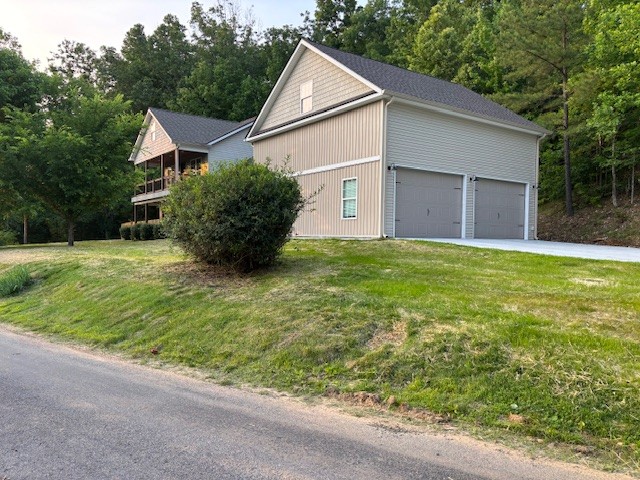 124 Hayes Fork Creek Road Dover, TN 37058 - Photo 3 of 29 a view of a house with backyard and garden