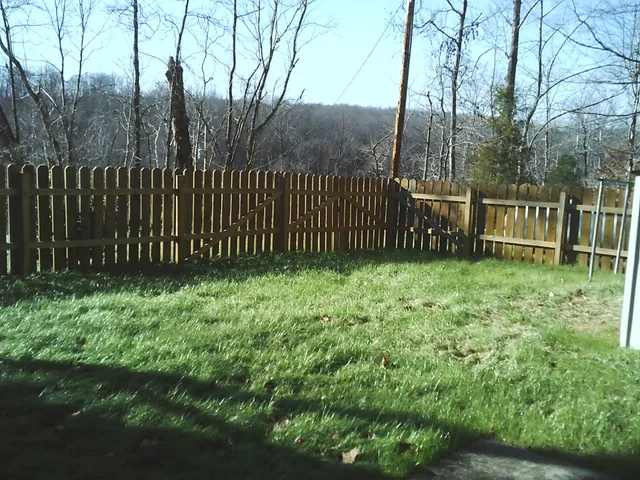 a view of a porch with a yard