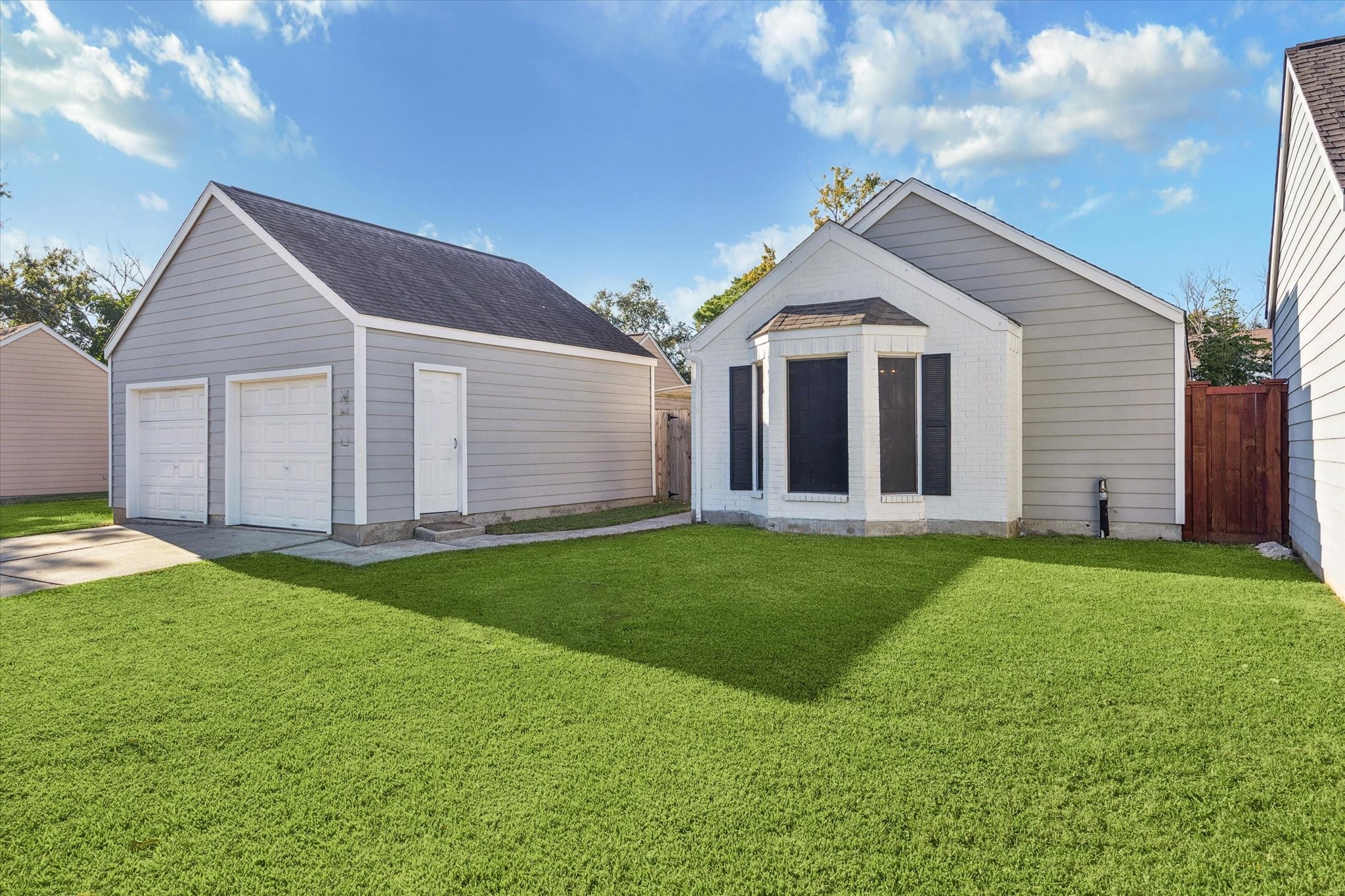 a view of a house with a yard