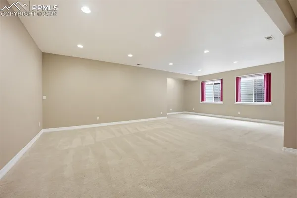 a view of an empty room with window
