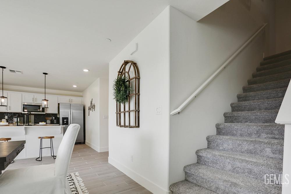 Undisclosed Address Bakersfield, CA 93314 - Photo 12 of 13 a view of a kitchen with furniture and a window