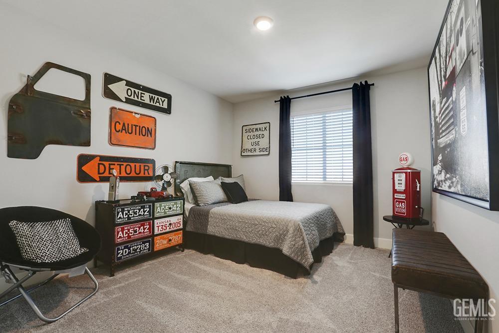 Undisclosed Address Bakersfield, CA 93314 - Photo 7 of 13 a bedroom with bed and a window