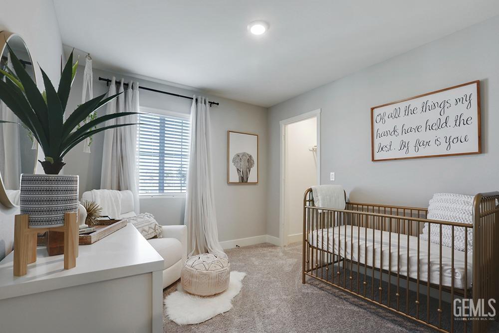 Undisclosed Address Bakersfield, CA 93314 - Photo 9 of 13 a bedroom with furniture and a window