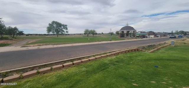 a view of a city street from a building