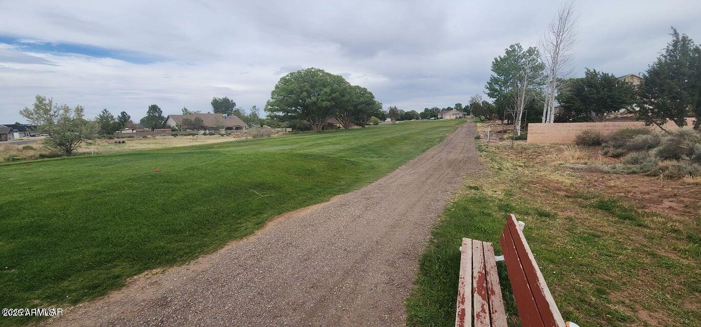 2642 West Foothill Circle, Unit 13 Snowflake, AZ 85937 - Photo 10 of 19 a view of a yard with table and chairs
