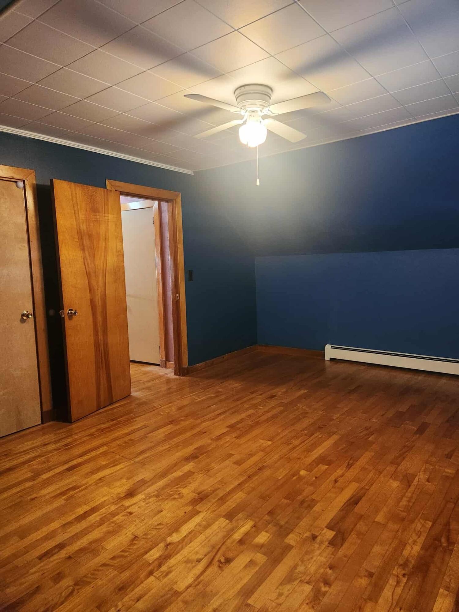 34 Cedar Street East Millinocket, ME 04430 - Photo 21 of 40 2nd floor bedroom