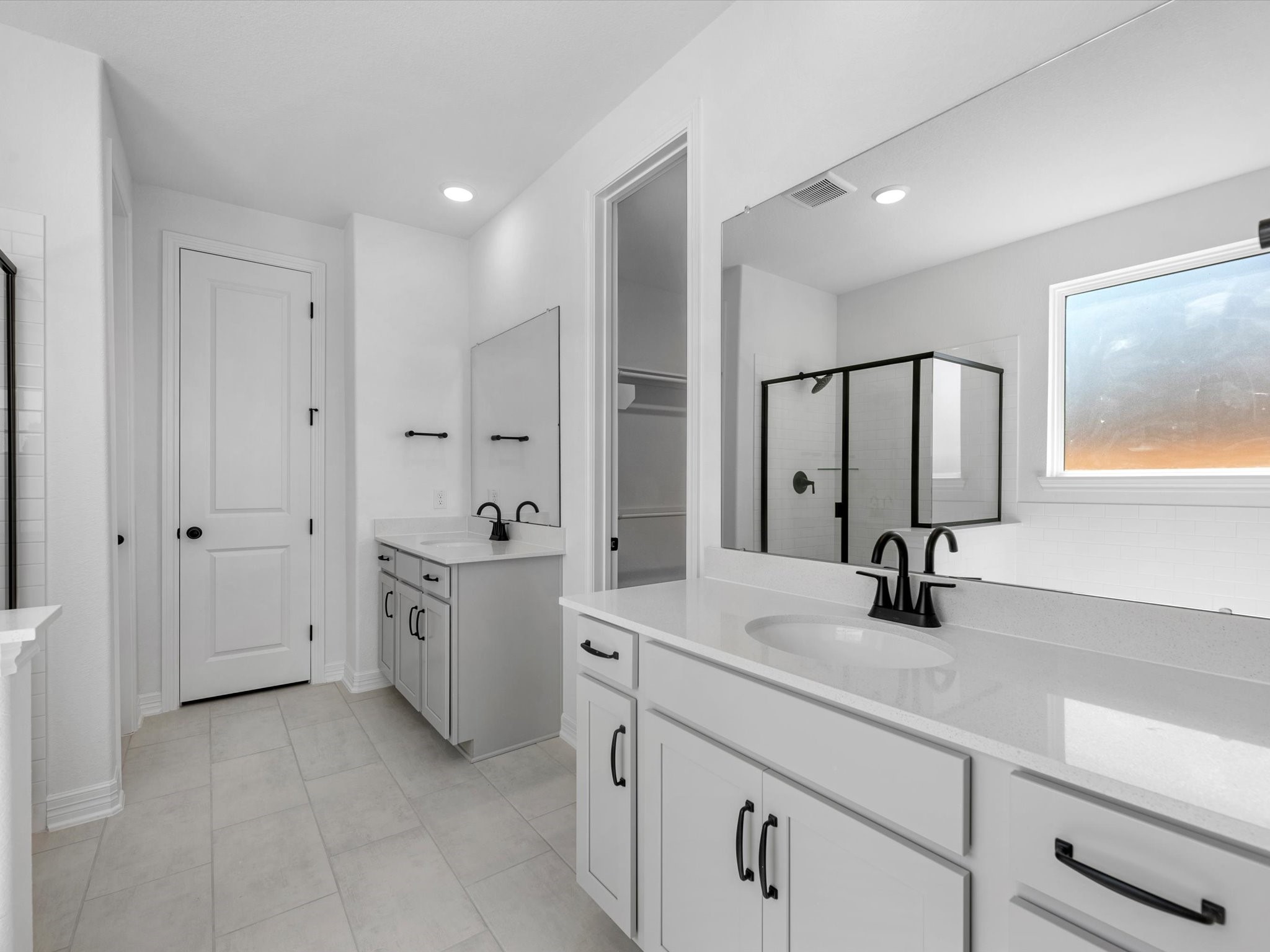 511 Selaura Street Rosenberg, TX 77471 - Photo 15 of 30 a bathroom with a double vanity sink mirror and