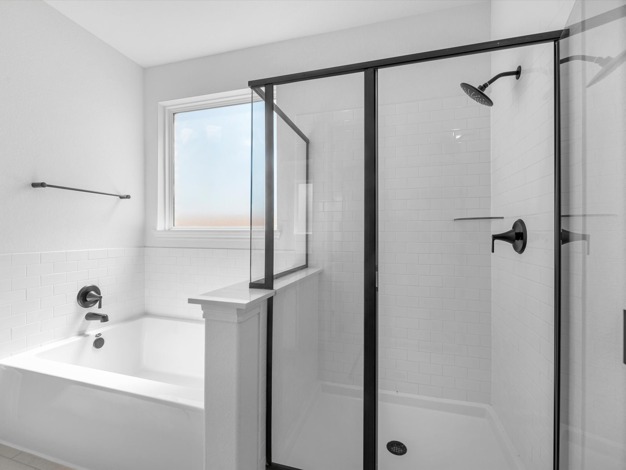 511 Selaura Street Rosenberg, TX 77471 - Photo 16 of 30 a bathroom with a bathtub a shower and a sink