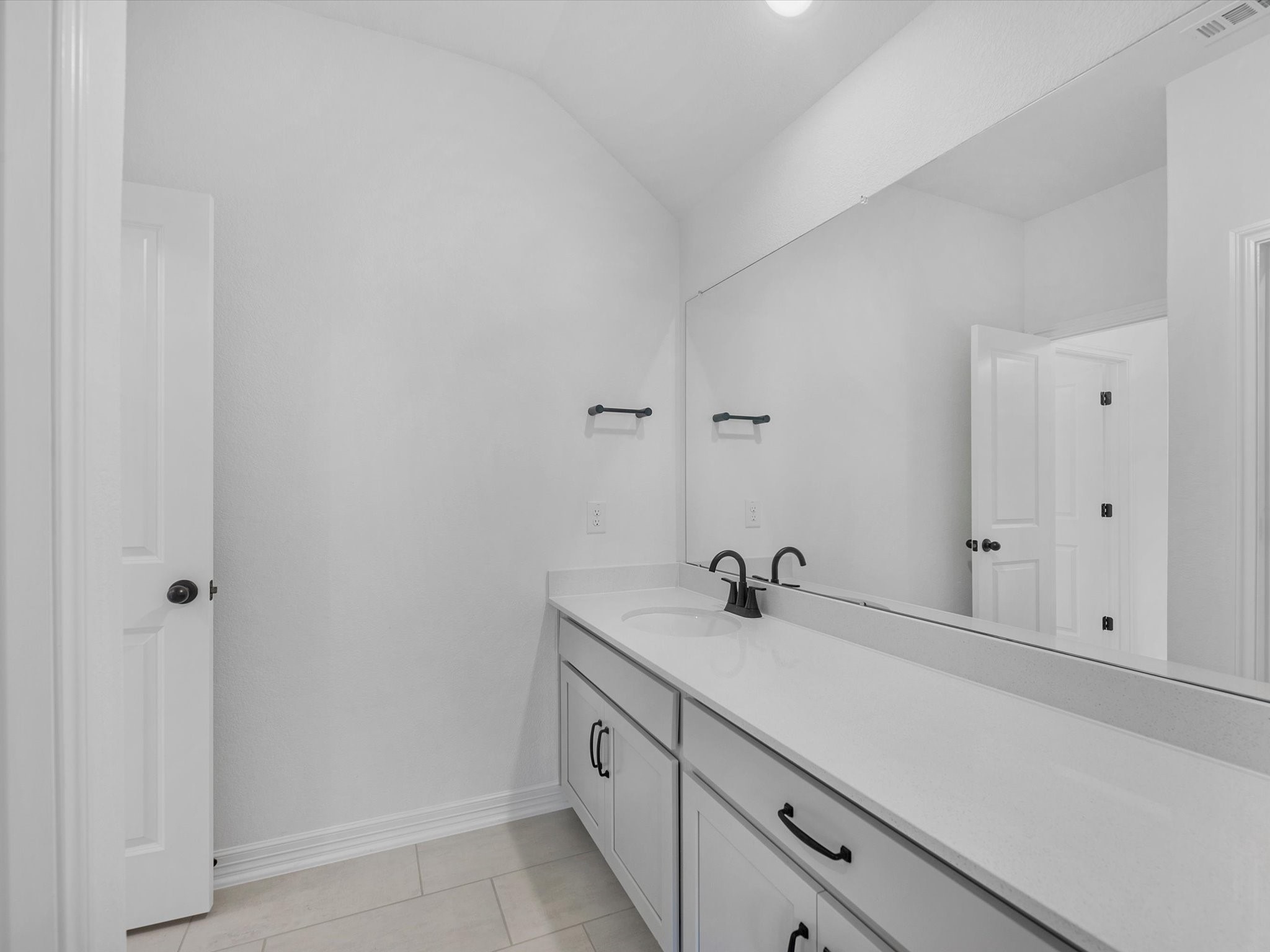 511 Selaura Street Rosenberg, TX 77471 - Photo 23 of 30 a bathroom with a sink and a mirror