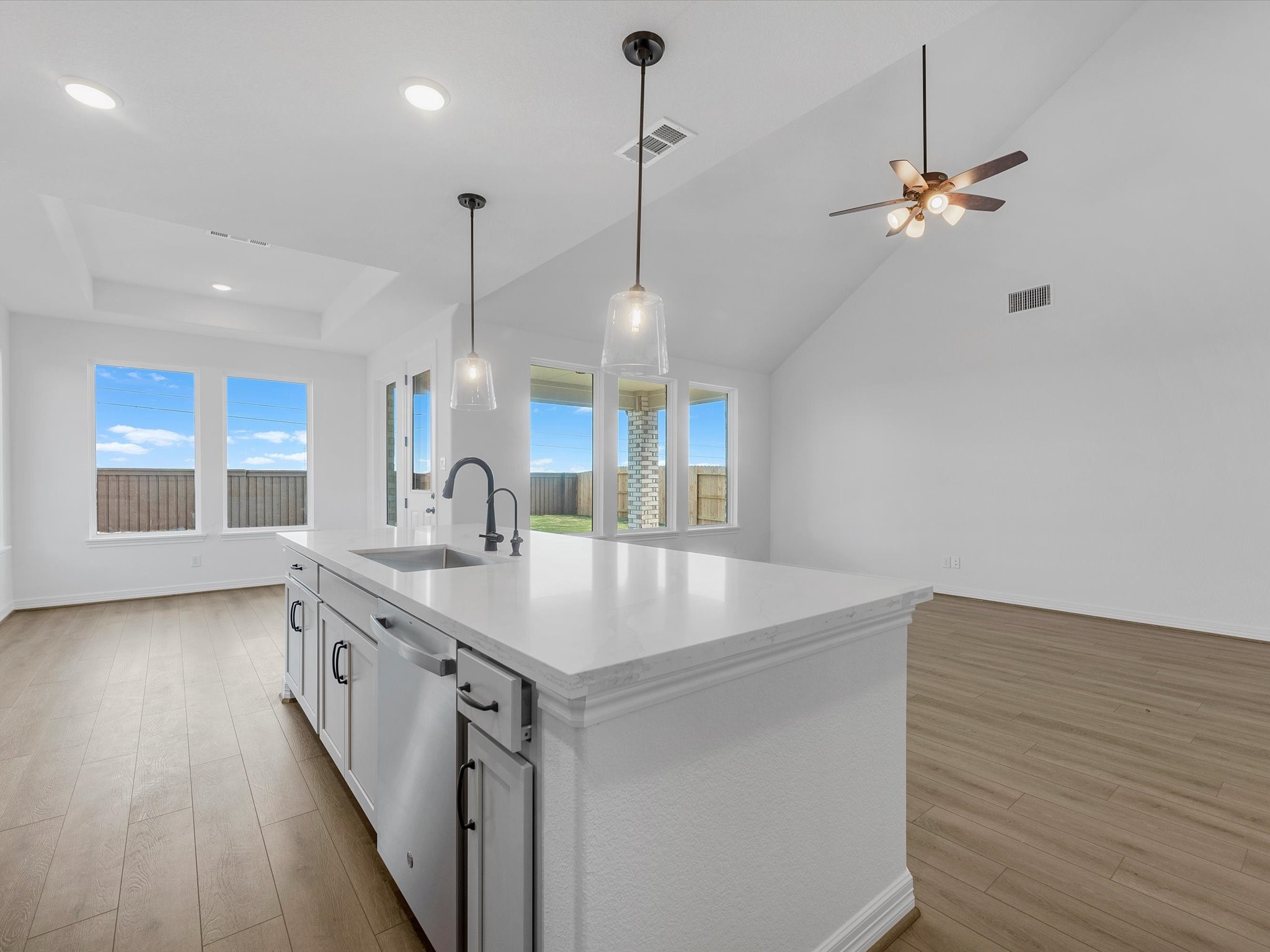 511 Selaura Street Rosenberg, TX 77471 - Photo 5 of 30 a kitchen with a sink and window