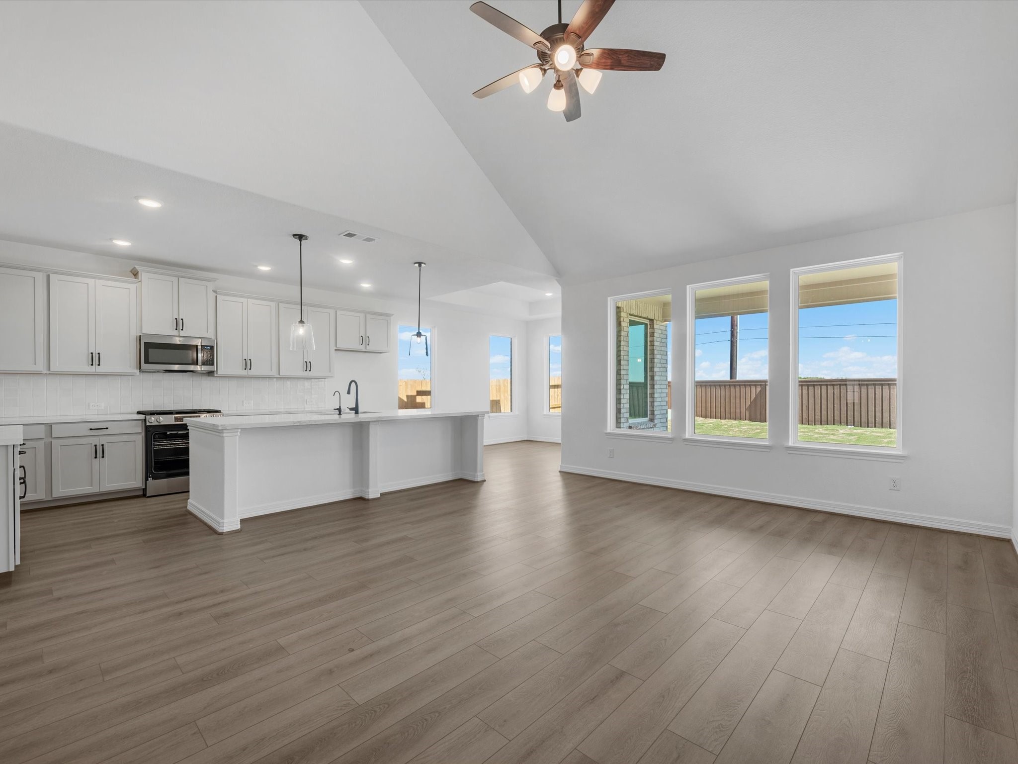 511 Selaura Street Rosenberg, TX 77471 - Photo 9 of 30 a view of kitchen with cabinets and wooden floor
