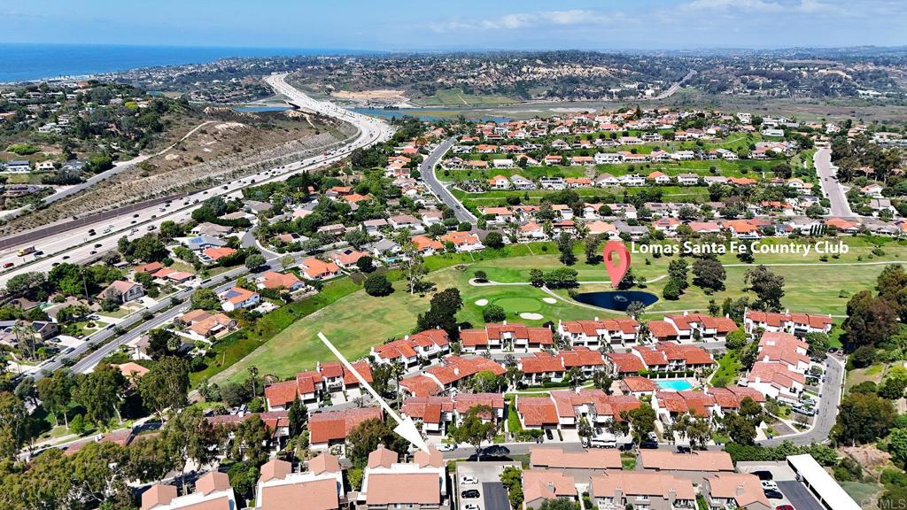 930 Via Mil Cumbres, Unit 52 Solana Beach, CA 92075 - Photo 8 of 34 an aerial view of multiple house