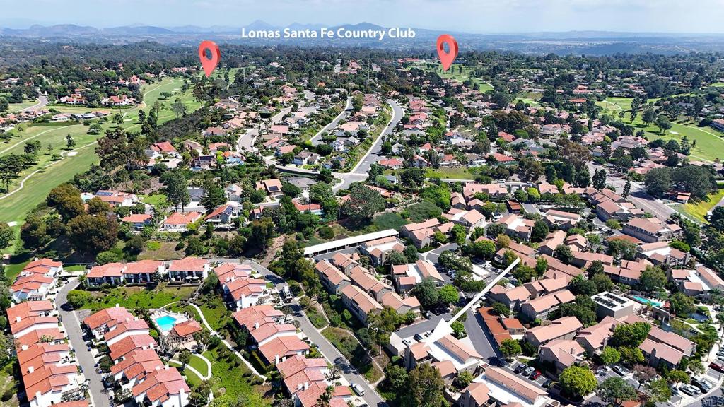 930 Via Mil Cumbres, Unit 52 Solana Beach, CA 92075 - Photo 9 of 34 an aerial view of multiple house