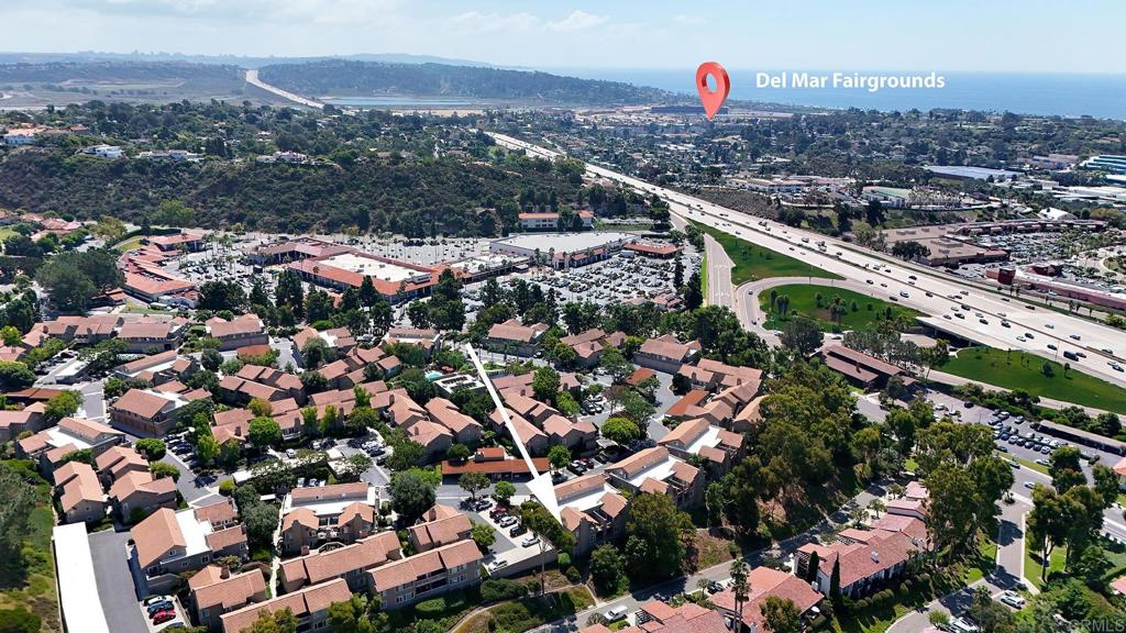 930 Via Mil Cumbres, Unit 52 Solana Beach, CA 92075 - Photo 10 of 34 an aerial view of multiple house