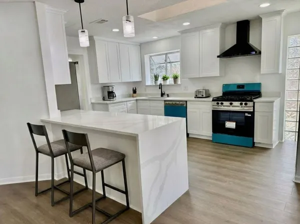 a view of kitchen and sink