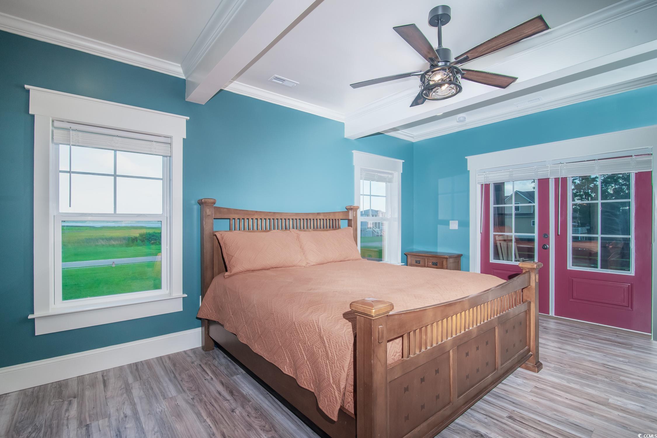 Tbd South Bay Street Georgetown, SC 29440 - Photo 3 of 28 Bedroom featuring beamed ceiling, ornamental moldi