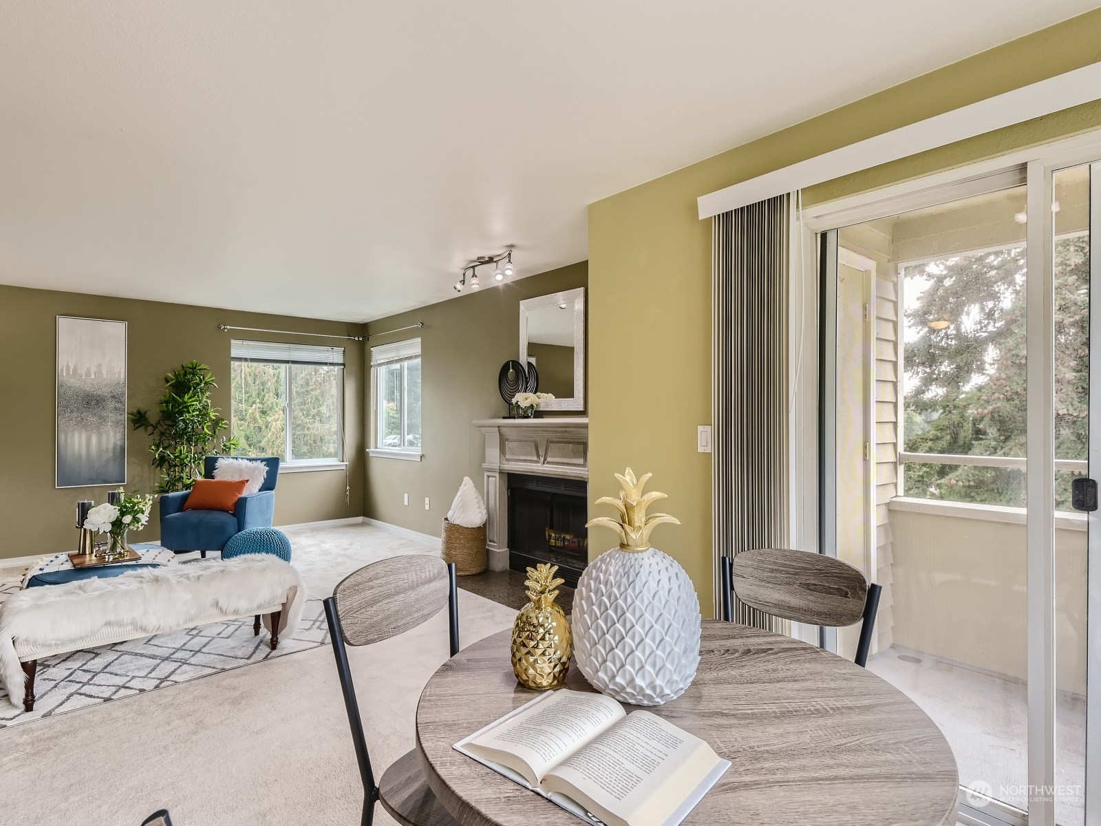 20328 Bothell Everett Highway, Unit B304 Bothell, WA 98012 - Photo 14 of 27 a living room with furniture fireplace and a large window