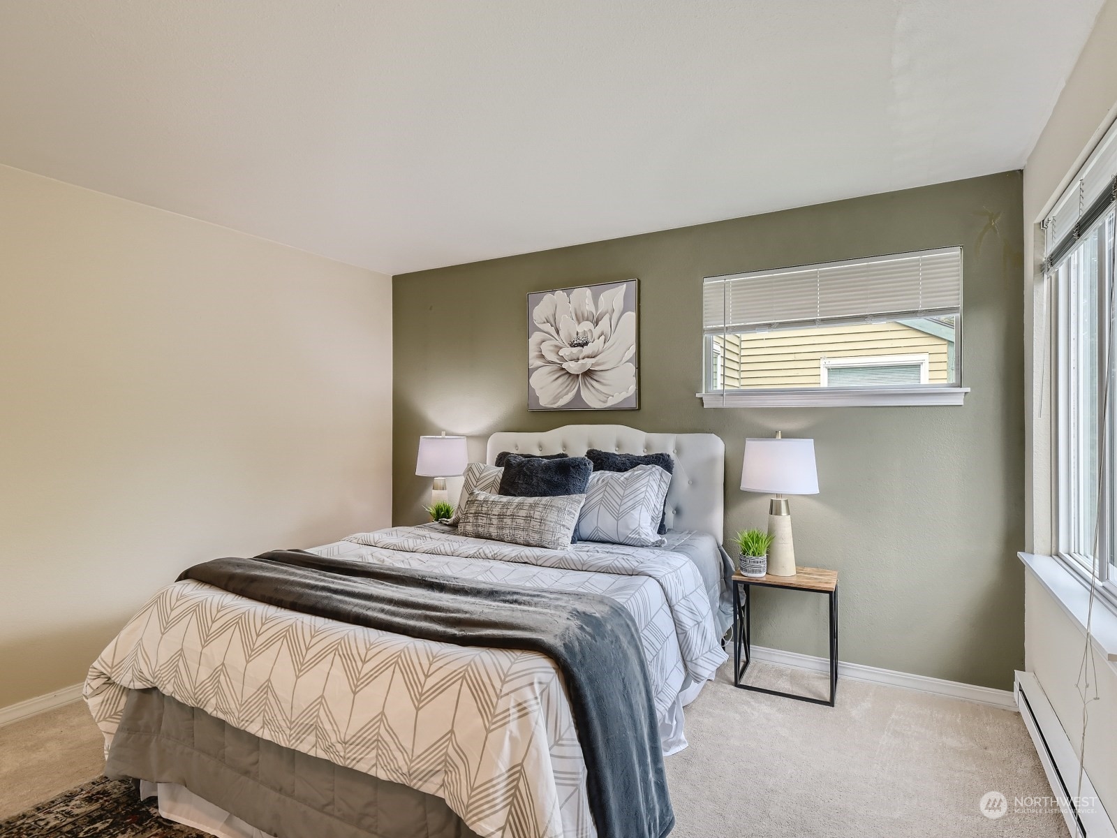 20328 Bothell Everett Highway, Unit B304 Bothell, WA 98012 - Photo 17 of 27 a bedroom with a bed and a window