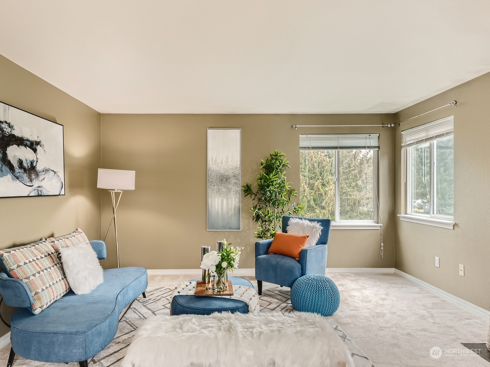 20328 Bothell Everett Highway, Unit B304 Bothell, WA 98012 - Photo 8 of 27 a living room with furniture and a window