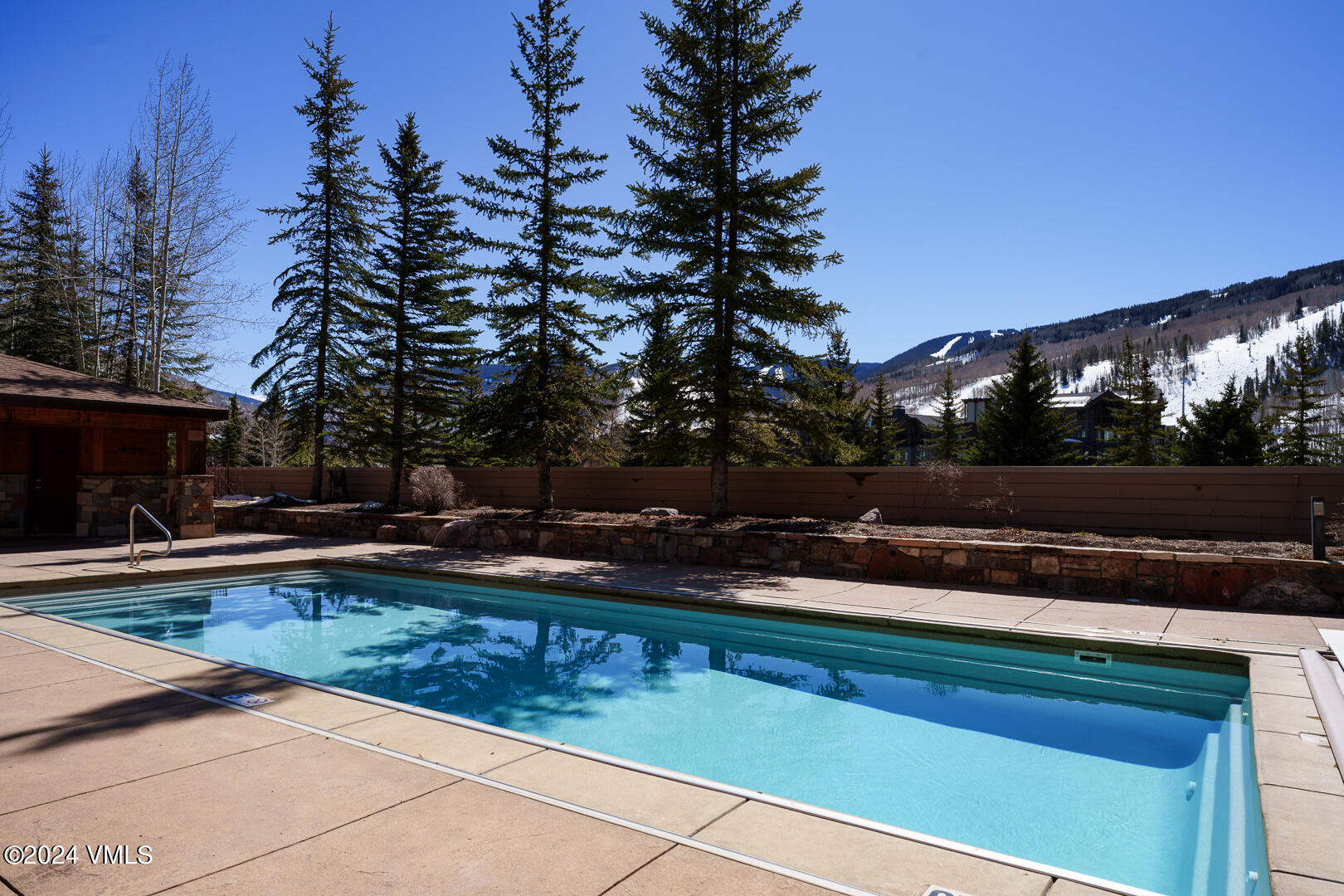625 North Frontage Road West, Unit 32B Vail, CO 81657 - Photo 26 of 34 a view of a yard with swimming pool and sitting area