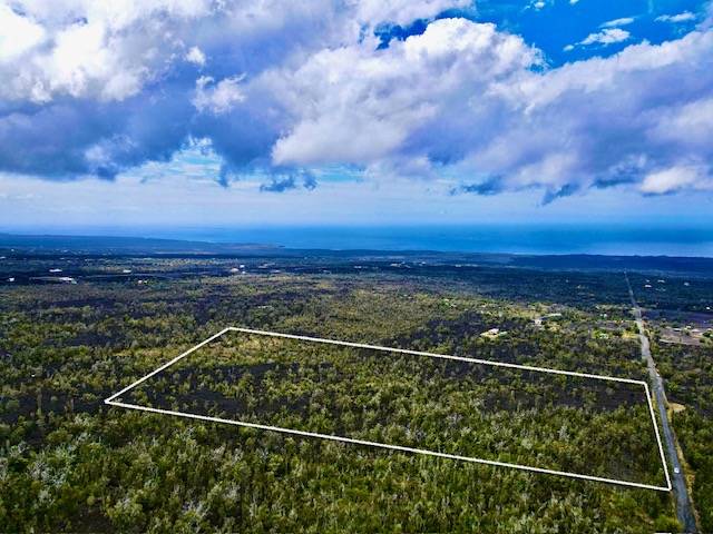 a view of a balcony with a view of a space