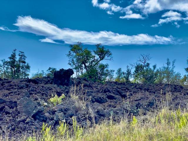92-1080 Rd To The Sea Ocean View, HI 96704 - Photo 20 of 28 a view of a lake with a house in a background