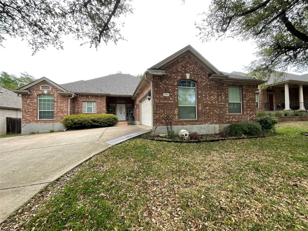 16901 Ennis Trail Austin, TX 78717 - Photo 1 of 1 a front view of a house with a garden
