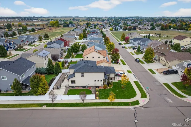 an aerial view of a house with a garden