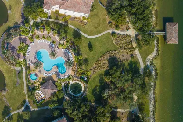 a view of a swimming pool with a patio