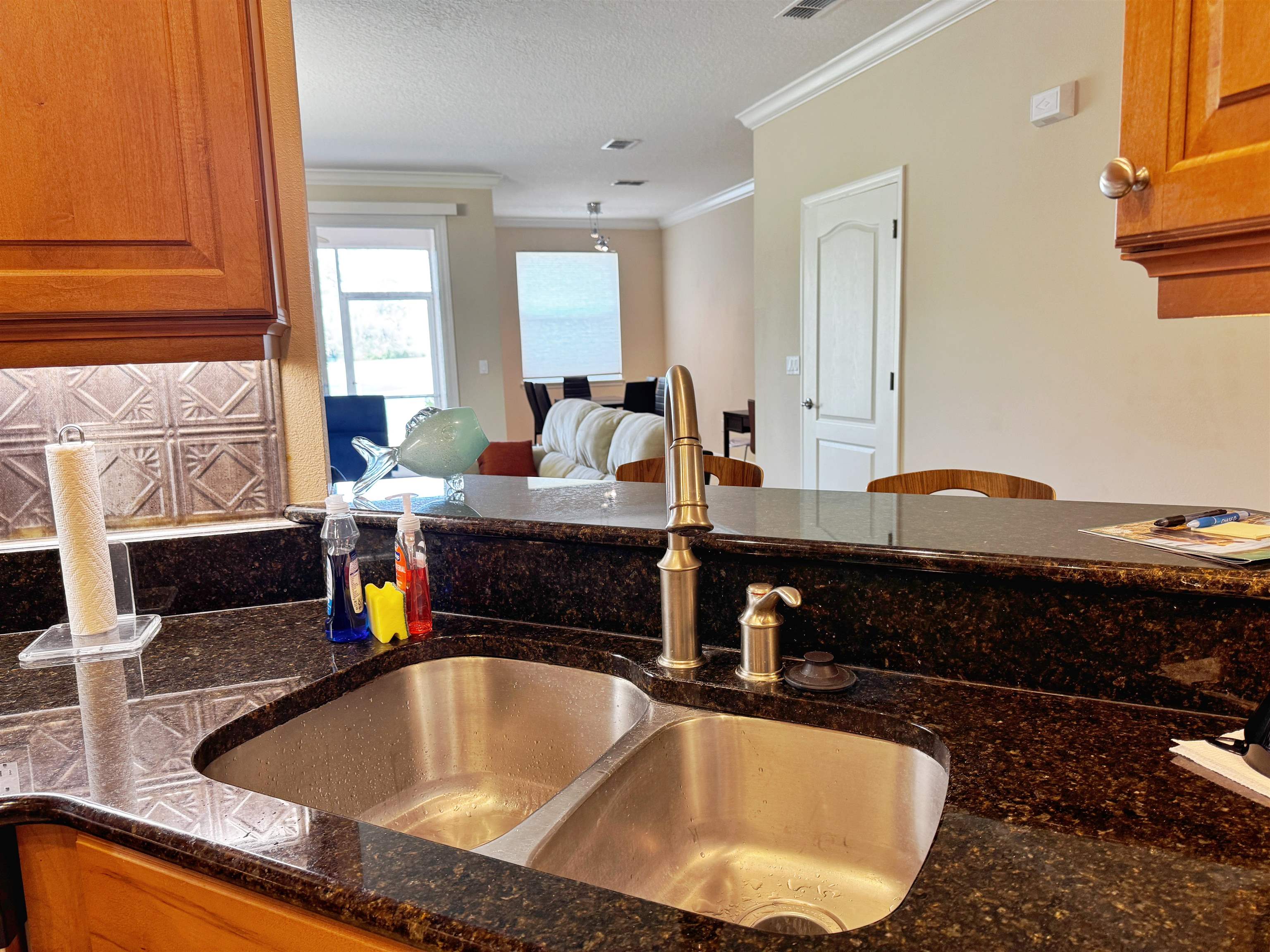 80 Riverview Bend South, Unit 814 Palm Coast, FL 32137 - Photo 8 of 39 a kitchen with a sink and a stove top oven