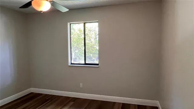 a view of a small space with wooden floor